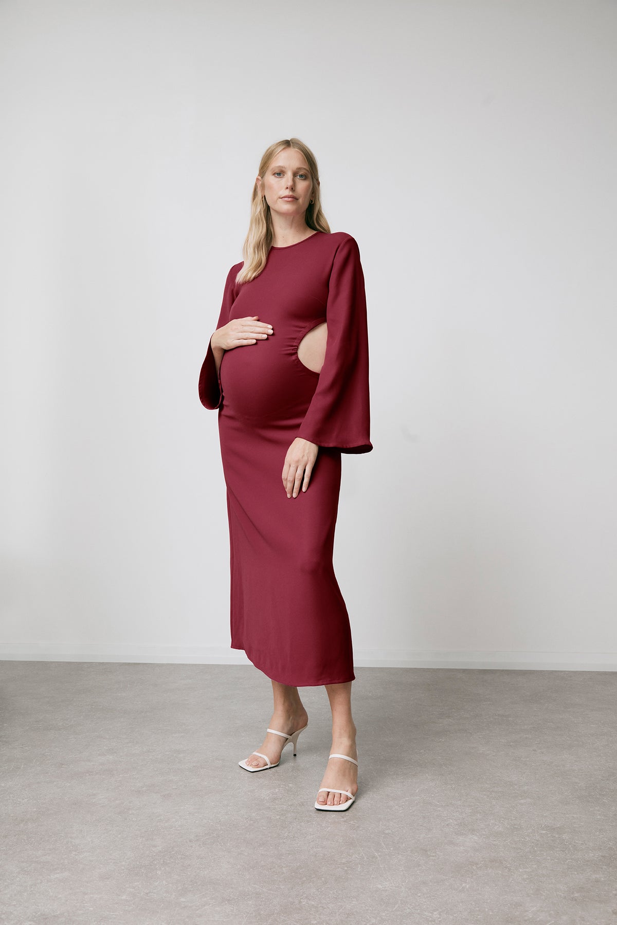 The Nixi burgundy cut-out maternity midi dress, front view
